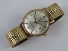 A Tissot Seastar Seven wristwatch having silvered dial with date aperture,