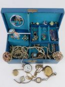 A quantity of assorted costume jewellery within vintage musical box.