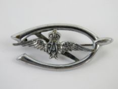 A chrome RAF 'Wings' and wishbone sweethear brooch.