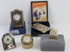 A quantity of assorted contemporary presentation and other Quartz miniature clocks. Together with