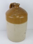 A large salt glazed stoneware jug 'J M Vernon Northampton & Towcester', 48cm high