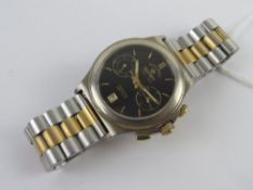 A Kosmos (?????? KOCMOC) stainless steel wristwatch having black dial, two subsidiary dials and date