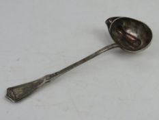 A white metal punch ladle having indistinct possibly Continental marks upon, having Art Nouveau