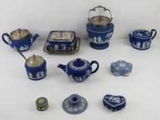 A Wedgwood Jasperware teapot having silver plated lid together with a quantity of other blue