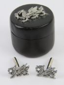 A pair of Welsh dragon cufflinks in presentation trinket pot.