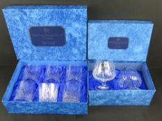 Doulton International; A boxed set of six crystal whiskey tumblers together with a boxed set of