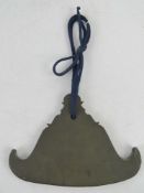 A heavy hand cast hanging Oriental style censor hanging hook.