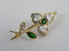 An 18ct gold floral brooch, stamped 750.