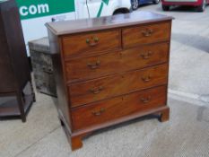 A good 19th century mahogany chest of two short over three long drawers, matching brass drop handles