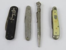 A pocket or friut knife having silvered inlay of a football player,