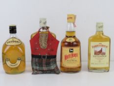 Lauder's Scotch Whiskey 70cl together with a 500ml Famous Grouse, 35cl Famous Grouse and 70cl