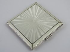 A Henry Clifford Davis of Birmingham 1949 enamel and silver Art Deco compact.