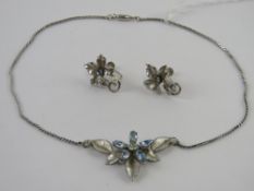 A suite of jewellery by Krementz comprising necklace and earrings in floral design. Within vintage
