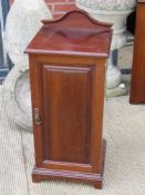 A single mahogany pot cupboard having field moulded door and single shelf, measuring 37 x 36 x