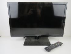 A Panasonic TX-24DS500B tv with remote.