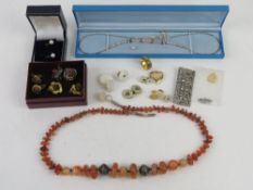A quantity of assorted silver and costume jewellery including pearl clip on earrings,
