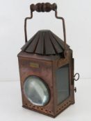 Railwayana; a copper railway lantern dated 1916 and bearing label 'Linley & Co London &