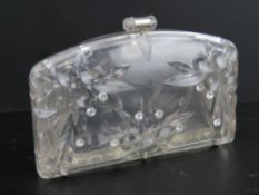 A mid century clear lucite plastic clutch handbag.