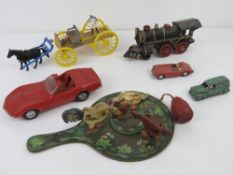 A quantity of vintage toys inc cast iron model train, Corgi Corvette model car,