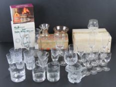 A quantity of assorted boxed and loose glassware.