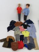 A Paul doll together with a Ken doll and a quantity of assorted clothing.