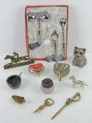 A quantity of assorted metalwares inc trinket pot, brass jockey themed doorstop, brass bottle