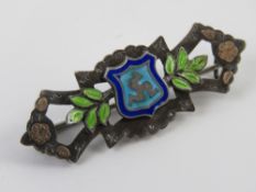 A delightful Chester hallmarked and enamelled silver sweetheart brooch having Isle of Man crest to