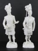 A pair of Sitzendorf German porcelain Scottish military figurines in traditional 18thC dress,