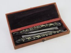 A finely made pair of cut throat/straight razors made by Fame W. Parramore Bailey Street