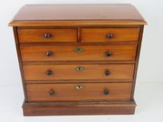 A delightful late Victorian mahogany apprentice piece chest of drawers comprising two short over