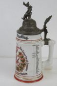 An early 20thC military themed ceramic beer stein, 'Reserve 1900-1902', having German Officer to