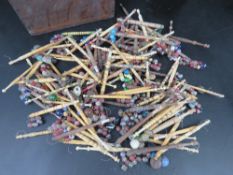 A large quantity of assorted lace bobbins made form cow bone and turned wood.