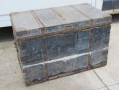 A substantial and impressive wooden silver chest having metal bracing throughout bearing label for