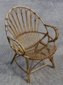 A c1960s bamboo and cane work lounge chair.