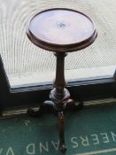 A delightful turned mahogany three-legged wine table standing 74cm high, 26cm dia, for restoration.