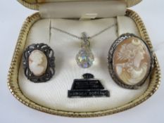 A Sterling silver rhodium finish Aurora Borealis pendant in original box together a Sterling