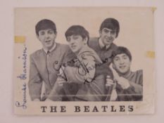 An Official Beatles Fan Club monochromatic photocard bearing the signature of George Harrison upon.