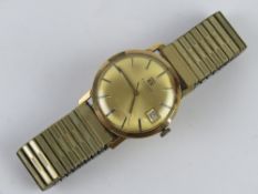 A 9ct gold Tissot wristwatch, hallmarked 375 to case back,