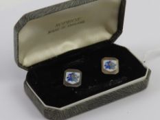 The Jester Club; a pair of HM silver enamelled cufflinks having jester depiction to one side with