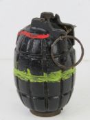 An inert WWI British No.5 Mk1 Mills Grenade made by Calthorps Motors of Birmingham.