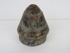 An inert WWII bomb fuze.