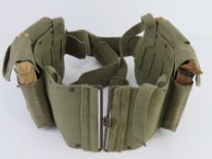 Four US BAR magazines in canvas pouch, un-issued.