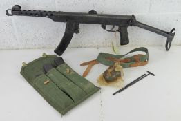 A deactivated Polish PPS-43 7.62mm sub machine gun.