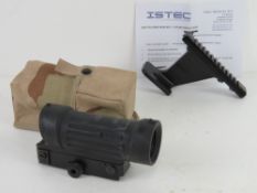 An AK Picatinny bracket (unissued) having pistol grip screw and washer, with instructions.