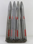 Four inert 40mm Bofors training rounds on clip.