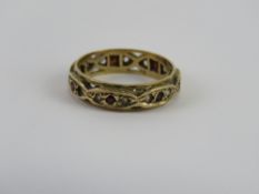 A 9ct gold eternity ring, one stone deficient, size L-M, 2.35g.