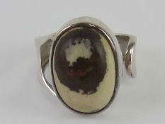 A silver hard stone ring, slight adjustable size, approx P-Q, stamped 925.