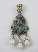 A silver pearl and mother of pearl pendant, stamped 925 and measuring 6.1cm in length.