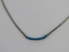 A Native American style turquoise and beaded necklace.
