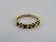 A 9ct gold ring set with sapphires and diamonds, hallmarked 375, size K, 1.93g.